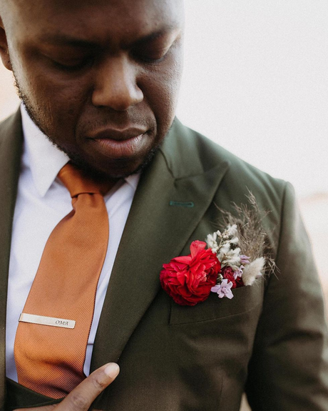 terracotta wedding colors groom suit
