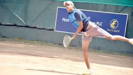 Defending men's open champion Thehan Wijemanne in action.     