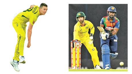 Australian paceman Josh Hazelwood who took 4 for 16 in action  (pix courtesy SLC)-Charith Asalanka top scored 38 making a shot during the Sri Lanka innings (pix courtesy SLC)