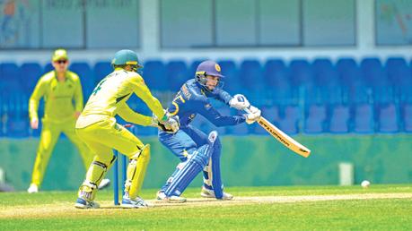 Sri Lanka A skipper Dhananjaya de Silva plays a shot during the first ODI against Australia A while wicketkeeper Alex Carey looks on. (Picture courtesy SLC)