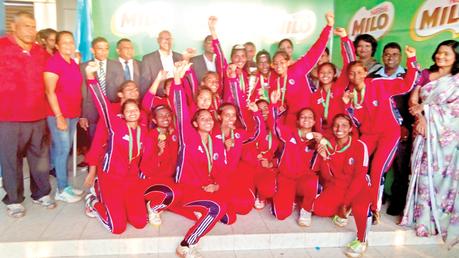 Champion Holy Family Balika Vidyalaya Netball team with officials