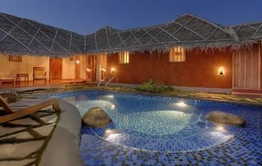 Pool at Evolve Back Kuruba Safari Lodge Hotel in Nagarhole, South India