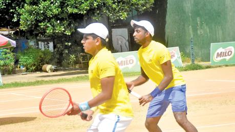 Yasitha de Silva and Dhilvan Herath in action