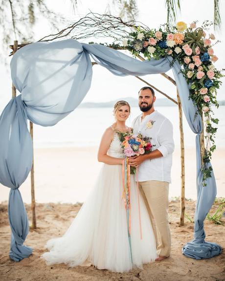 teal and rust wedding arch