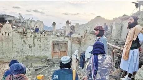 Afghans look at the destruction caused by an earthquake in Paktika Province, eastern Afghanistan yesterday. (Picture courtesy Bakhtar News Agency)