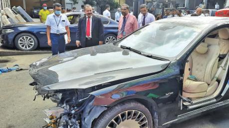 Customs Director General Major General (Rtd) Vijitha Ravipriya inspects the cars. Picture by Rukmal Gamage