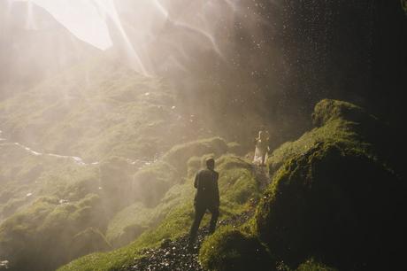Couple hiking in Iceland on their way to the wedding ceremony