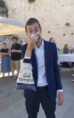 blowing your nose at the Kotel