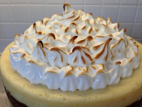 blowtorch results on top of key lime pie finishing off italian meringue piped swirls
