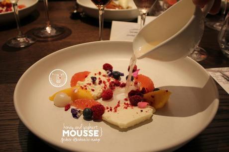 yoghurt and honey mousse with lychee, blueberries and mango