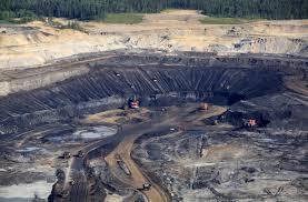 An existing open pit tar sands mine