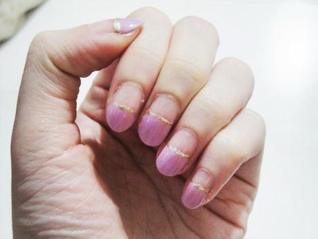 Nail it: tinge of purple and gold