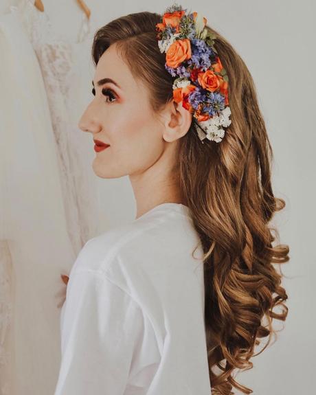 bridal hairpiece side with bright flowers on loose hair rebecca.murphy.beauty