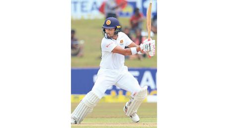 Dinesh Chandimal, who scored 80 in the first innings, plays a shot at the Galle International Stadium yesterday. (Pic by Hirantha Gunatilake)