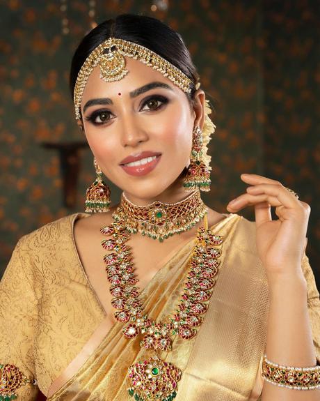 indian bridal makeup smokey eyes gloss nude lips ronan_mili