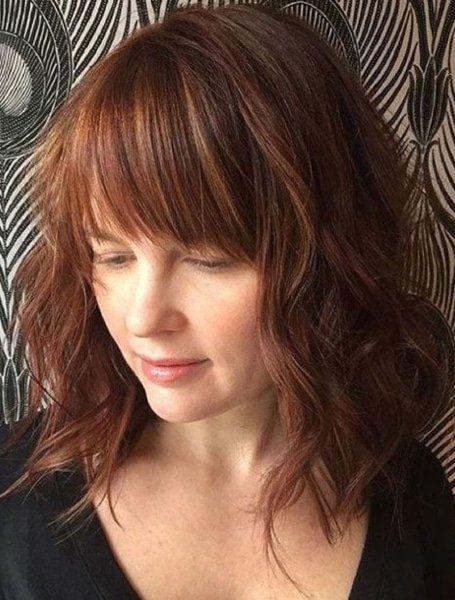 Low Maintenance Haircuts for Women Over 50: Asymmetrical Lob Haircut