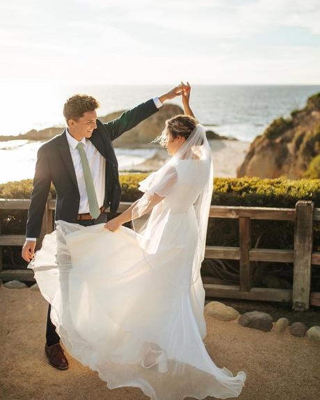 how to make a wedding playlist newlyweds dancing together
