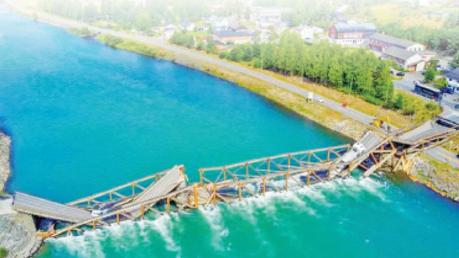 A drone image of the Tretten bridge over the River Laagen that collapsed, in Gudbrandsdalen, Norway on Monday.