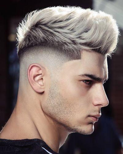 Men’s Hairstyles: White Spiky Quiff Over a Dark Fade