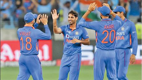 Bhuvneshwar Kumar celebrates  Rahmanullah Gurbaz’s wicket.