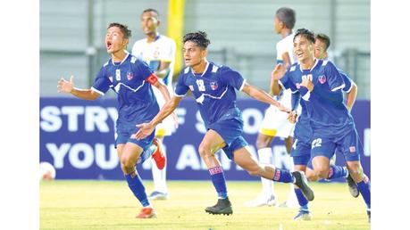 Nepal players celebrate a goal