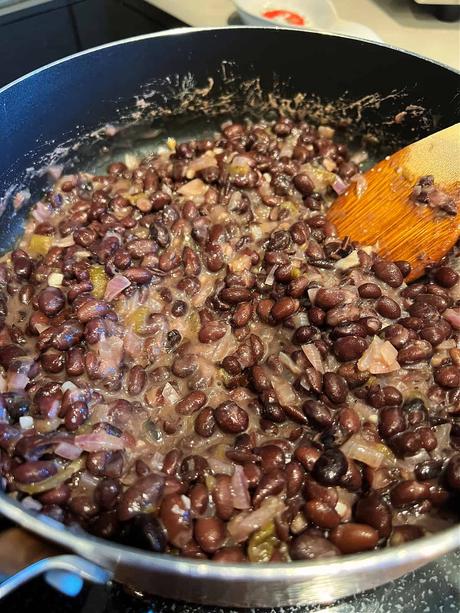 skillet of refried beans for my mexican salad bowl