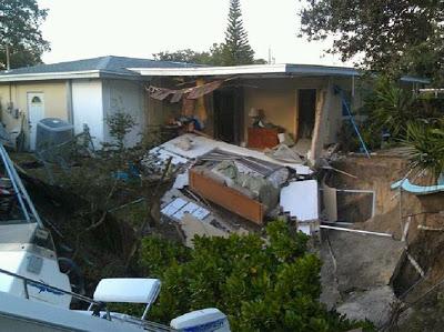 Sinkhole Swallows Boat, Part Of House In Florida (Video)