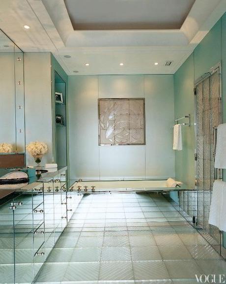 |Residential  interiors that are inspiring with its color scheme|master bathroom decorated in glass paneling and green painted walls.