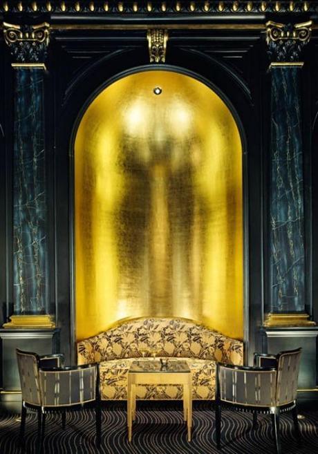 Simone Design Blog|Commercial interiors that are inspiring with its color scheme|A hotel bar decorated in gold and black.