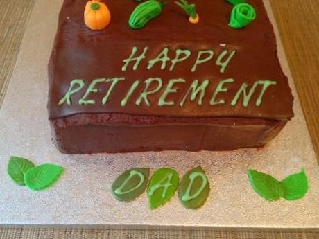 happy retirement dad cake with stenciled lettering personalised gardener with fondant leaves chocolate icing