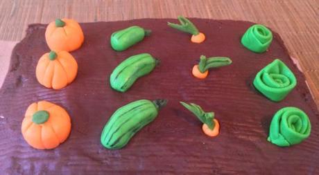 allotment vegetable garden cake chocolate icing for soil and fondant decorations pumpkins courgettes carrots cabbages perfect for retirement fathers day dad ideas