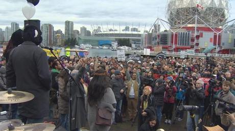 Nearly 1,000 people gathered outside Vancouver's Science World to protest pipelines and oilsands expansion on Saturday.