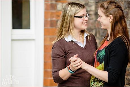 Two girls holding hands in civil partnership engagement shoot York St John University