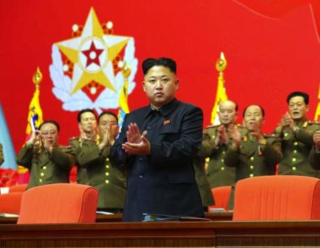 Kim Jong Un applauds during the 2nd National Security Personnel Meeting  (Photo: Rodong Sinmun).