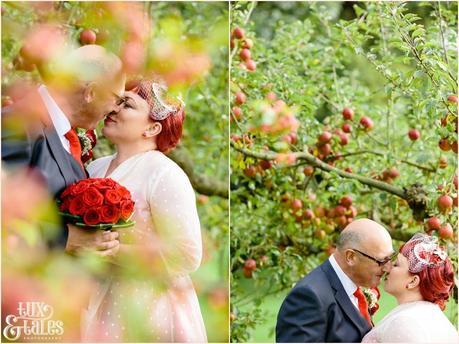 Wedding photography poses at vintage themed wedding in apple orachard