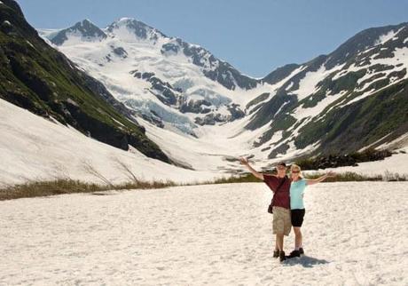 Hiking on snow in shorts and a t-shirt in sunny Alaska
