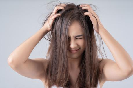 Daily Hack: Using floss to tame frizz and flyaways