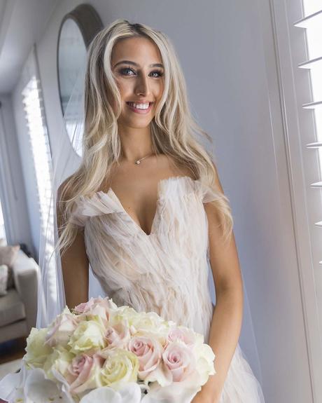 Real Weddings: Tayler & Jayden real wedding tayler and jayden bride with bouquet