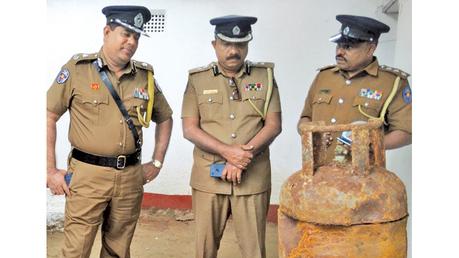 The cut gas tank where the heroin was found.