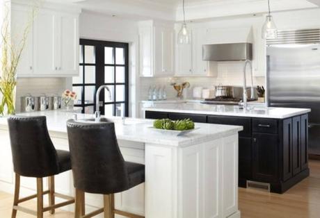 kitchens with black appliances and white cabinets