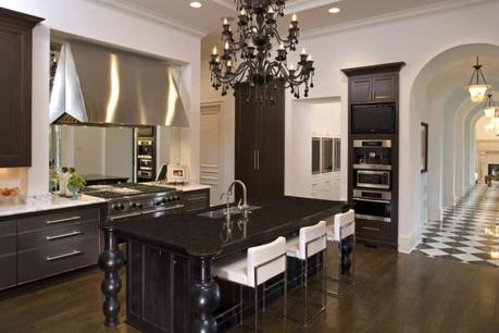 kitchen cabinet with black appliances