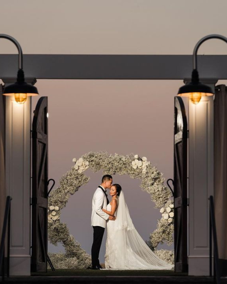 best wedding venues in new england newlyweds near floral arch