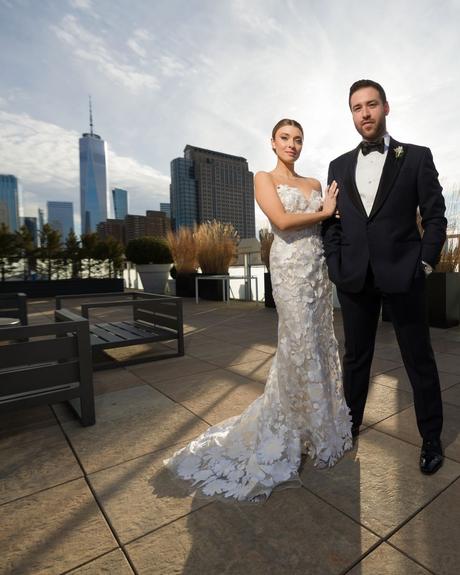 best wedding venues in new york newlyweds standing on the roof