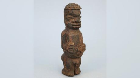 Cambridge University to return Benin Bronzes to Nigeria Small carved wooden male figure, listed as originating from the ‘Benin West Africa Expedition 1897’.