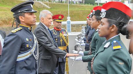 The President commissioning the Officers.