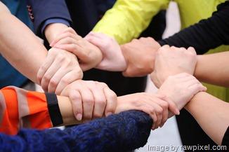 Free hands joining together image, public domain teamwork CC0 photo.