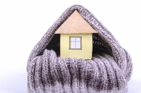 A house wrapped up in a scarf to keep it warm