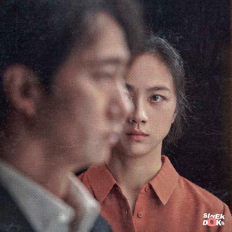 Image Still from Decision to Leave (2022) by Park Chan-wook depicting Park Hae-il and Tang Wei