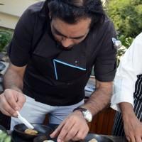 Chef Gaggan Anand plating up The Chowpati year 2050
