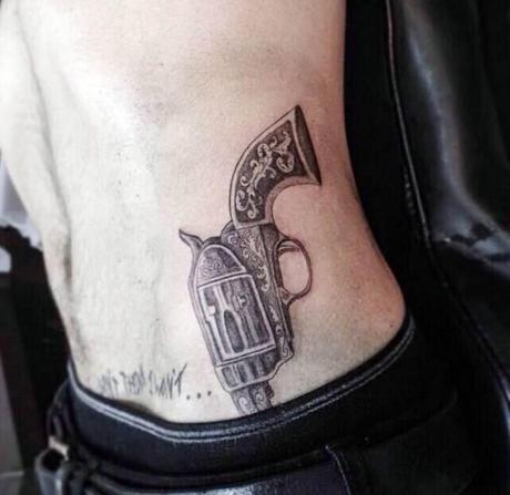 Could Zayn's 'gun tattoo' outshine 1D Day?